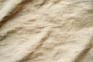 This is a closeup view featuring a soft, elegant beige fabric texture that captivates with its subtle waves and depth photo