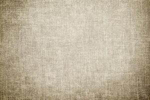 A subtle, elegantly textured beige fabric background ideal for various creative design applications photo