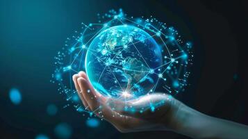 Hand holding a digital glowing globe with interconnected lines and nodes representing global connectivity. photo