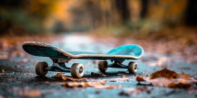 Close-up of a skateboard on a leaf-covered path in an autumn setting, emphasizing freedom and adventure. photo