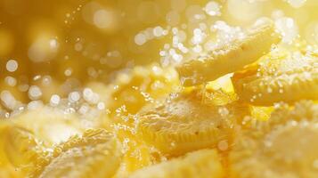 Close-up shot of golden coins splashing in liquid, reflecting light and creating a dynamic, sparkling effect. photo