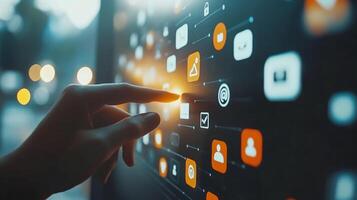 A hand touches a vibrant touchscreen showing technology icons for online connectivity, cloud storage, and security features, all on a deep blue background, creating a modern futuristic scene photo