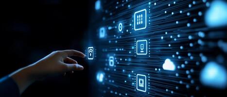 A hand reaches out towards a vibrant digital screen showcasing various technology icons, which symbolize the importance of online connections, cloud storage solutions, and vital security features photo