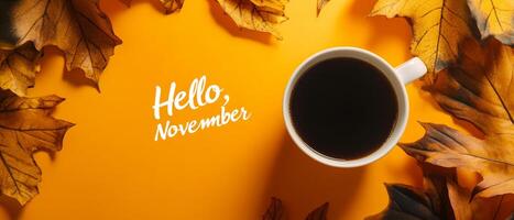A warm and cozy scene that features a steaming cup of coffee carefully placed on a saucer, beautifully surrounded by vibrant and colorful autumn leaves, celebrating the delightful arrival of November photo