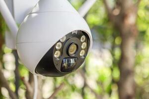 Security IP CCTV camera using solar energy install on the tree for home security system photo
