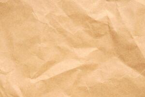 Abstract crumpled and creased recycle brown paper texture background photo