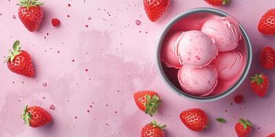 Strawberries arranged around container of pink ice cream on countertop photo