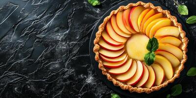Apple tart with concentric slices of fruit on open-faced pastry photo