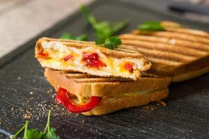 grilled fried bread toasts with filling inside photo