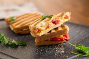 grilled fried bread toasts with filling inside photo
