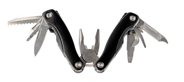 Steel multitool isolated on white background. Opened multitool with pliers, file, blade, screwdriver, bottle opener and saw, with a white background. Multi tool with expanded tools and pliers photo