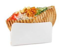 Doner with a crispy crust and tasty filling with sauce isolated on a white background. photo