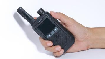 Black portable radio ht or walkie talkie in a white background photo