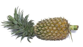 fresh juicy pineapple pieces isolated on white background photo