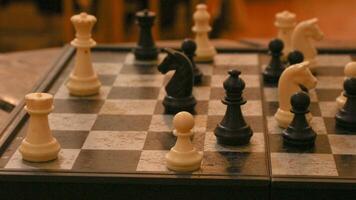 Chess pieces on the chessboard. Chess Game. Close Up Playing a Game of Chess. Strategy game that requires concentration and intelligence. photo