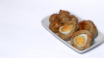 Pentol is a typical Indonesian spicy snack made from beef and tapioca flour. photo