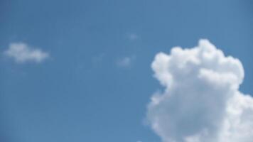 Aerial view of fluffy clouds and blue sky over the city photo