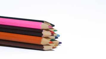 Color pencils isolated on white background photo