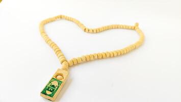 holy , tasbih. for moslem isolated on white background photo
