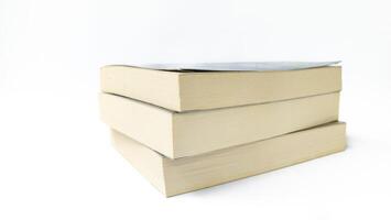 stack of colorful books on white background, open book, stack of books isolated on background, education, read, study, school, library, dictionary. photo