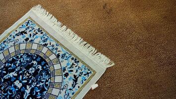 Sajadah. The prayer mat is used as a base when praying the Muslims. photo