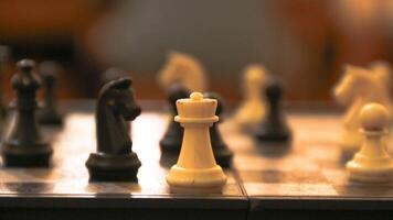 Chess pieces on the chessboard. Chess Game. Close Up Playing a Game of Chess. Strategy game that requires concentration and intelligence. photo