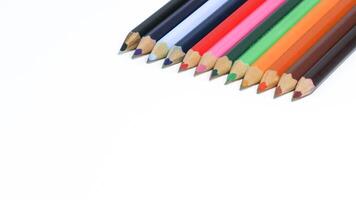 Color pencils isolated on white background photo