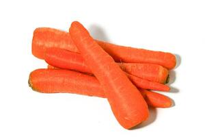 Group of fresh carrots isolated on white background. photo