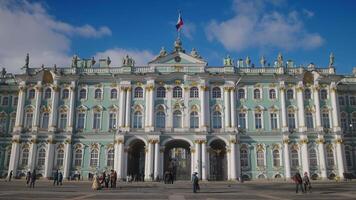 Beautiful facade of old palace building. Action. Facade of ancient palace on sunny summer day. Beautiful architecture of old building of St. Petersburg Hermitage video