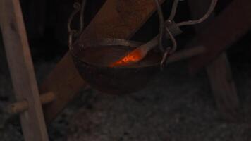 A heated boiler for working with forging iron. Media. A burning and warming boiler to aid the deformation of iron. video