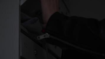 Mailbox with documents. Concept. Male strong hands that take out papers from a small mailbox in the entrance. video