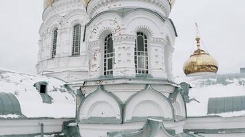 Facade of the orthodox church with golden domes. Clip. Concept of religion and architecture. video