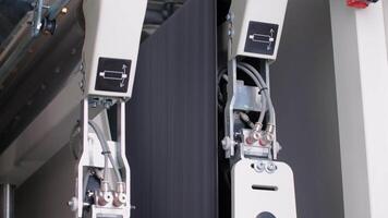 Moving tape on factory machine. Creative. Track with tape in moving machine at factory. Conveyor belt at factory video