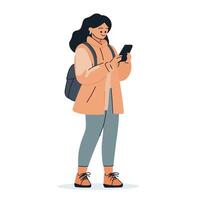 Young Woman Reading on Smartphone While Standing vector