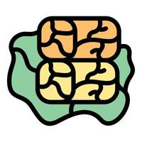 Two pieces of dried fruit paste forming a stack on a green leaf vector