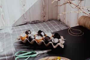 Creating Easter holiday decoration from egg shell. Diy do it yourself step by step instruction. Crafting preparation holiday. Work tools photo