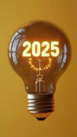 Light bulb showing year 2025 symbolizing future innovations and progress photo