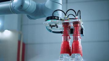 Robot arm Automation technology. Tools for saving energy effort and making the work of engineers more convenient in modern factories. Automation factory tech concept with robotic arms lifting goods. photo