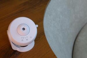 Galaxy projector for studying solar system at home, learning at home using special projector to project planets and stars on ceiling of room, device for displaying galaxy at home photo