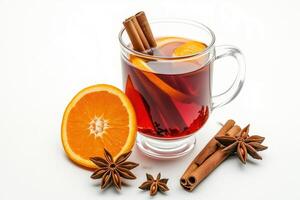 a glass of mulled wine with an orange slice and an anise star photo
