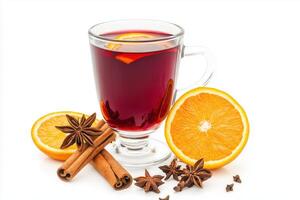 glass cup Hot red mulled wine with orange slice, anise and cinnamon sticks on white background photo