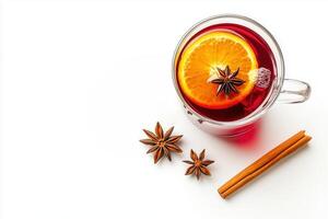 glass cup Hot red mulled wine with orange slice, anise and cinnamon sticks on white background photo