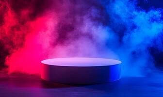 White podium with red and blue smoke on dark background. photo