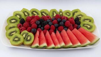 A plate of sliced fruit on a white background photo