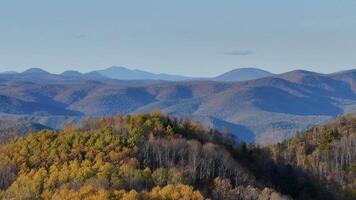 A Panoramic View of a Mountain Range in Autumn video