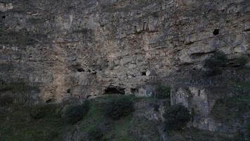 aerial view remains old monastery complex in Armenia carved in rocks video