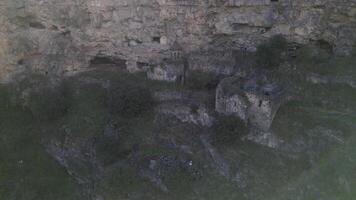aerial view remains old monastery complex in Armenia carved in rocks video