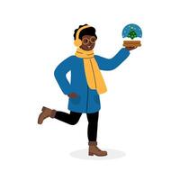 A person joyfully running while holding a snow globe featuring a Christmas tree in winter attire vector