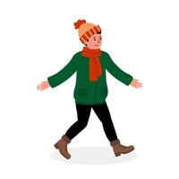 A happy child in a green winter outfit walks against a plain backdrop vector