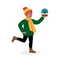 A cheerful child carrying a snow globe with a tree while wearing winter attire vector